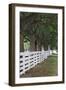 Gate and white wooden fence and overhanging trees, Shaker Village of Pleasant Hill, Harrodsburg, KY-Adam Jones-Framed Photographic Print