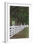 Gate and white wooden fence and overhanging trees, Shaker Village of Pleasant Hill, Harrodsburg, KY-Adam Jones-Framed Photographic Print