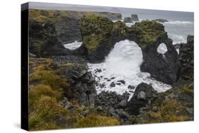 Gatklettur basalt rock arch on the Snaefellsness Peninsula, Iceland, Polar Regions-Jon Reaves-Stretched Canvas