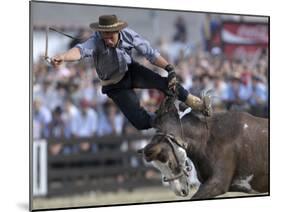 Gaucho, or Cowboy, is Thrown from a Horse as He Competes in a Rodeo in Montevideo-null-Mounted Photographic Print
