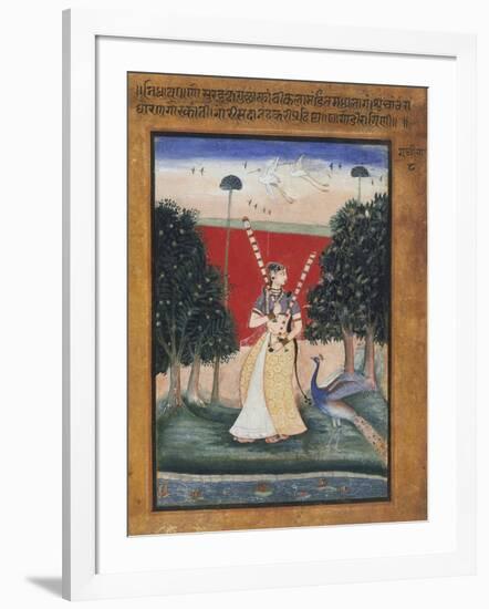 Gauri Ragini, First Wife of Malkos Raga, Folio from a Ragamala (Garland of Melodies)-null-Framed Art Print