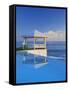 Gazebo Reflecting on Pool with Sea in Background, Long Island, Bahamas-Kent Foster-Framed Stretched Canvas