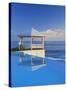 Gazebo Reflecting on Pool with Sea in Background, Long Island, Bahamas-Kent Foster-Stretched Canvas