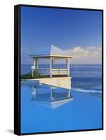 Gazebo Reflecting on Pool with Sea in Background, Long Island, Bahamas-Kent Foster-Framed Stretched Canvas