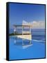 Gazebo Reflecting on Pool with Sea in Background, Long Island, Bahamas-Kent Foster-Framed Stretched Canvas