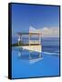 Gazebo Reflecting on Pool with Sea in Background, Long Island, Bahamas-Kent Foster-Framed Stretched Canvas