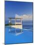 Gazebo Reflecting on Pool with Sea in Background, Long Island, Bahamas-Kent Foster-Mounted Photographic Print