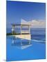 Gazebo Reflecting on Pool with Sea in Background, Long Island, Bahamas-Kent Foster-Mounted Photographic Print