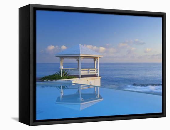 Gazebo Reflecting on Pool with Sea in Background, Long Island, Bahamas-Kent Foster-Framed Stretched Canvas