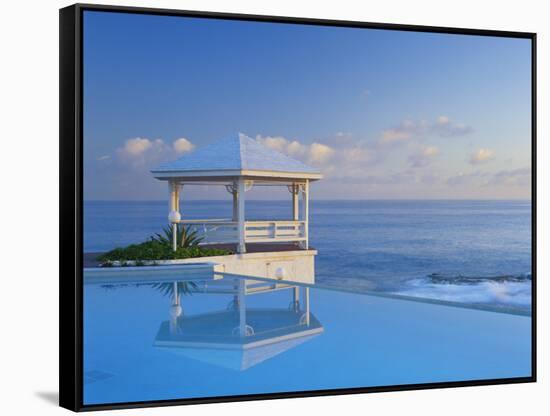 Gazebo Reflecting on Pool with Sea in Background, Long Island, Bahamas-Kent Foster-Framed Stretched Canvas