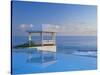 Gazebo Reflecting on Pool with Sea in Background, Long Island, Bahamas-Kent Foster-Stretched Canvas