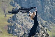 Youn Woman Wearing Black Dress Outdoor on Rocks-geanina bechea-Photographic Print