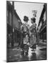 Geisha Girl Chats with Young Novice, Yoko Minami, Who is Studying to Become a Geisha-Alfred Eisenstaedt-Mounted Photographic Print