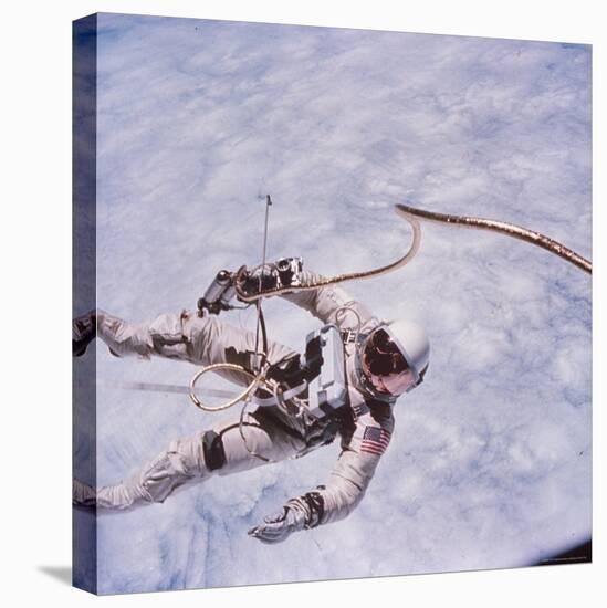 Gemini 4 Astronaut Edward H. White II Floating in Space During First American Spacewalk-James A^ Mcdivitt-Stretched Canvas