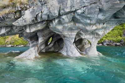 https://imgc.allpostersimages.com/img/posters/general-carrera-lake-chile-south-america-marble-outcropping-showing-water-erosion_u-L-Q1DH5J30.jpg?artPerspective=n