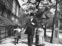 Incredibly Well Dressed Man, Woman and Child Walking by Perfect Brownstone Apartment Buildings-George B^ Brainerd-Photographic Print