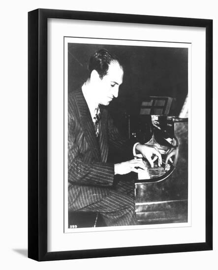 George Gershwin (1898-1937) American Composer, at the Piano, c.1935-null-Framed Photographic Print