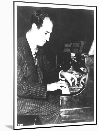 George Gershwin (1898-1937) American Composer, at the Piano, c.1935-null-Mounted Photographic Print