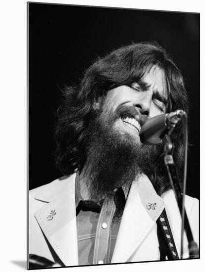 George Harrison Performing at a Rock Concert Benefiting Bangladesh, aka Kampuchea-Bill Ray-Mounted Premium Photographic Print