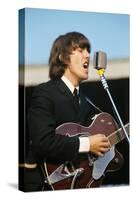 George Harrison Playing Guitar and Singing-null-Stretched Canvas