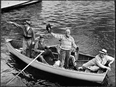 President Harry S. Truman Standing in Rowboat, Fishing with Others