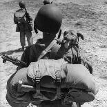 US Marine Jesse Goin Carrying His Dog Towards the Front During the Fighting on Kwajalein-George Strock-Photographic Print