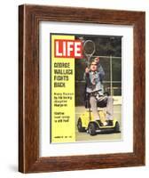 George Wallace in Wheelchair, About to Hit Tennis Ball, November 24, 1972-Bill Eppridge-Framed Photographic Print