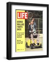 George Wallace in Wheelchair, About to Hit Tennis Ball, November 24, 1972-Bill Eppridge-Framed Photographic Print