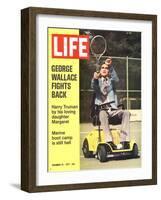 George Wallace in Wheelchair, About to Hit Tennis Ball, November 24, 1972-Bill Eppridge-Framed Photographic Print