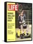 George Wallace in Wheelchair, About to Hit Tennis Ball, November 24, 1972-Bill Eppridge-Framed Stretched Canvas