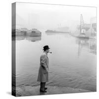 Georges Simenon Smoking a Pipe by the Navigli in Milan-null-Stretched Canvas