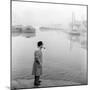 Georges Simenon Smoking a Pipe by the Navigli in Milan-null-Mounted Photographic Print