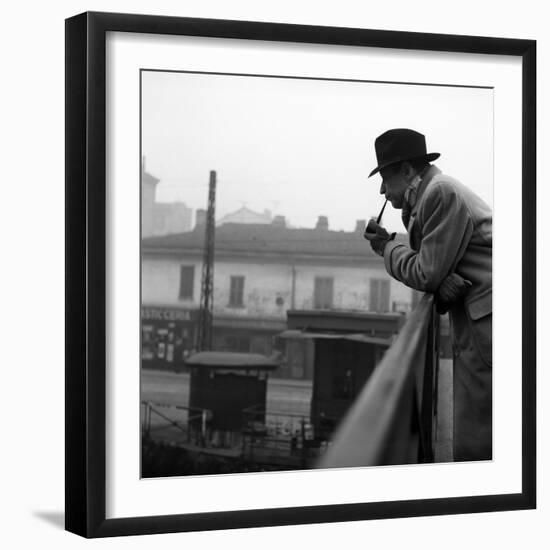 Georges Simenon Smoking the Pipe on a Bridge in Milan-null-Framed Photographic Print