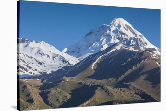 Georgia, Georgian Military Highway, Kazbegi-Stepantsminda. Mt. Kazbek.-Walter Bibikow-Stretched Canvas