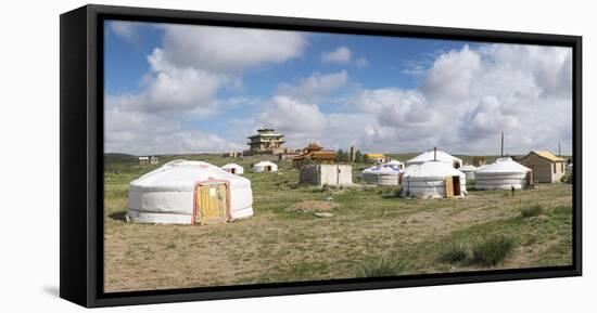 Ger camp and Tsorjiin Khureenii temple in the background, Middle Gobi province, Mongolia, Central A-Francesco Vaninetti-Framed Stretched Canvas