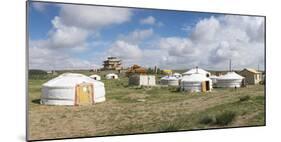 Ger camp and Tsorjiin Khureenii temple in the background, Middle Gobi province, Mongolia, Central A-Francesco Vaninetti-Mounted Photographic Print