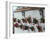 Geraniums along White Wall of Palacio de Mondragon, Ronda, Spain-Merrill Images-Framed Photographic Print