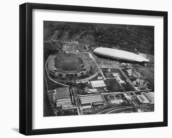 German Airship 'Graf Zeppelin' Flying over Wembley During the Fa Cup Final, London, 1930-null-Framed Giclee Print