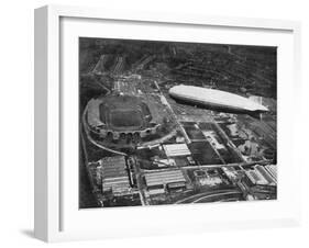 German Airship 'Graf Zeppelin' Flying over Wembley During the Fa Cup Final, London, 1930-null-Framed Giclee Print