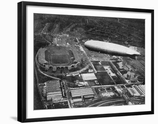 German Airship 'Graf Zeppelin' Flying over Wembley During the Fa Cup Final, London, 1930-null-Framed Giclee Print