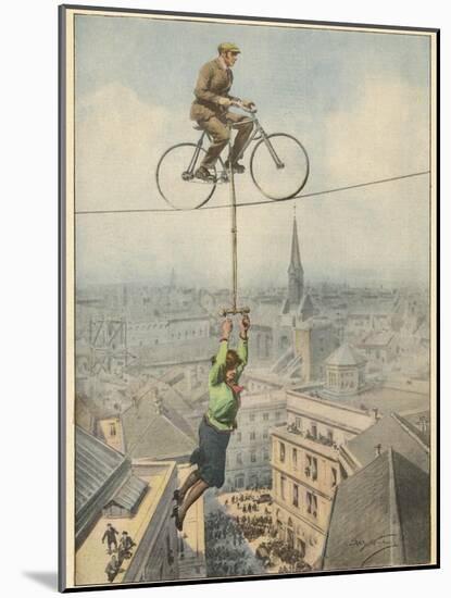 German Husband and Wife Team Perform a Dramatic Tightrope Cycling Act-Achille Beltrame-Mounted Photographic Print