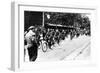 German Soldier Cycling Through the Streets of Paris, June 1940-null-Framed Photographic Print
