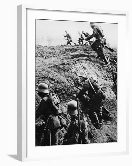 German Soldiers Attacking Out of a Trench During World War I-Robert Hunt-Framed Photographic Print