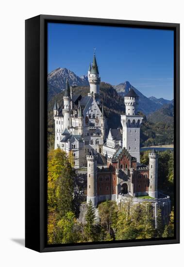 Germany, Bavaria, Hohenschwangau, Schloss Neuschwanstein castle, elevated view, fall-Walter Bibikw-Framed Stretched Canvas