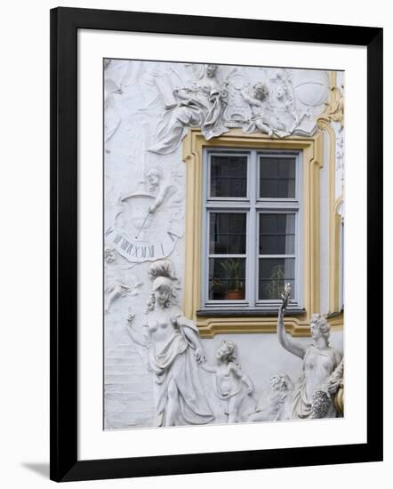 Germany, Bavaria, Munich, Ornate Stucco or Plasterwork Adorning the Front of a House in the City-John Warburton-lee-Framed Photographic Print