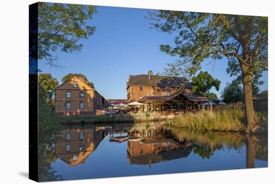 Germany, Brandenburg, Spreewald (Spree Forest), Schlepzig, Restaurant Along Canal-Chris Seba-Stretched Canvas