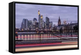 Germany, Hesse, Frankfurt on the Main, Skyline at Dusk, Light Tracks of Passing Cars-Bernd Wittelsbach-Framed Stretched Canvas