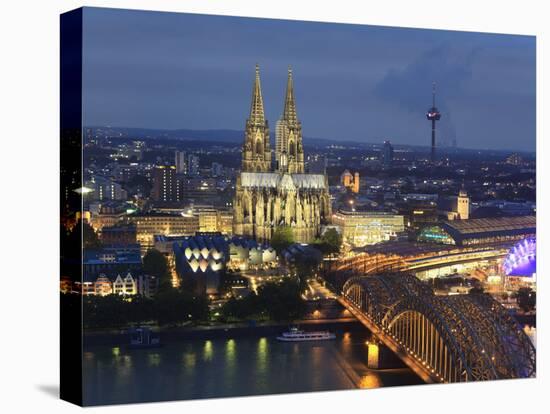 Germany, North Rhine Westphalia, Cologne (Koln), Hohenzoller Bridge over River Rhine and Cathedral-Michele Falzone-Stretched Canvas