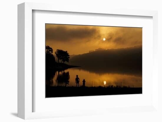 Germany, North Rhine-Westphalia, Playing Children on the Lake in Front of the Morning Sun-Benjamin Engler-Framed Photographic Print
