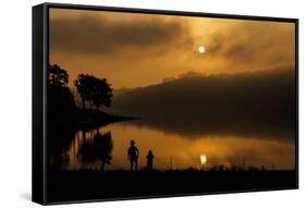 Germany, North Rhine-Westphalia, Playing Children on the Lake in Front of the Morning Sun-Benjamin Engler-Framed Stretched Canvas